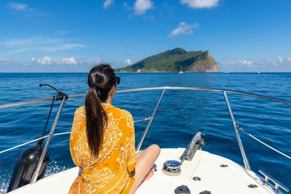 Travel woman sit on the luxury boat