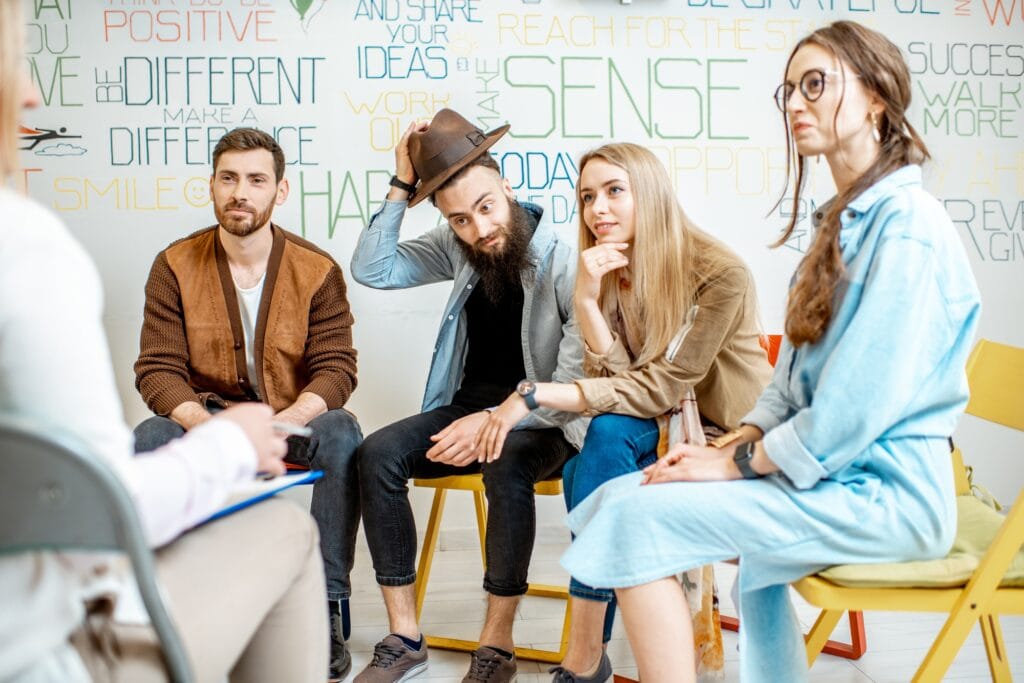 Group of people during the psychological therapy indoors